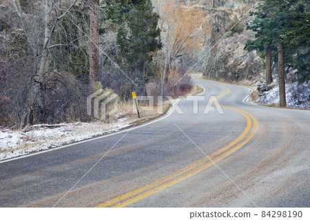 windy mountain road 84298190
