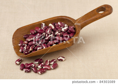 rustic scoop of Anasazi beans rustic scoop of Anasazi beans 84301089