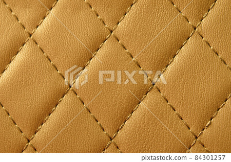 Texture of yellow leather as background. Texture of yellow leather as background. 84301257