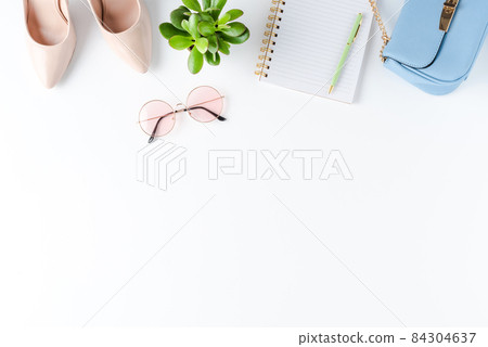 Women outfit on white background. Top view Women outfit on white background. Top view 84304637