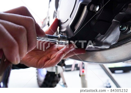 Image of motorcycle maintenance 84305232