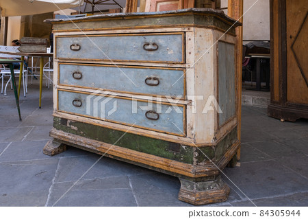 Old chest drawer on flea market in Arezzo Italy 84305944