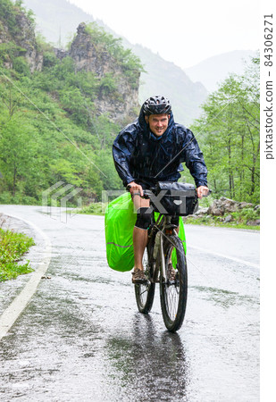 Traveling cyclist in Pontic Alps 84306271