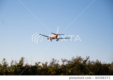 Airplane just before landing 9 84306371