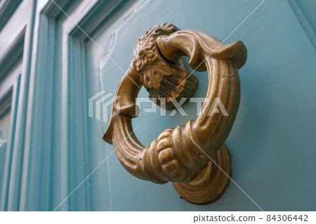 Old italian door handle close-up Old italian door handle close-up 84306442