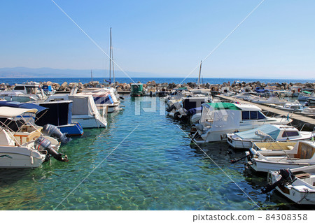 View from Icici's seaside promenade, harbor, Adriatic coast, Kvarner bay, city details, Croatia View from Icici's seaside promenade, harbor, Adriatic coast, Kvarner bay, city details, Croatia 84308358