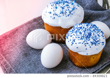 Easter eggs. Happy Day Bright Easter. Orthodox Easter holiday. Traditional food. Creative stylish trend Homemade easter cake. Selective focus 84309821
