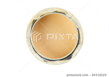 Painters tape on open paint can top view 84310029