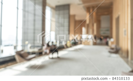 Blurred hotel or office building lobby blur background interior view toward reception hall, modern luxury white room space with blurry corridor and building glass wall window Blurred hotel or office building lobby blur background interior view toward reception hall, modern luxury white room space with blurry corridor and building glass wall window 84310133