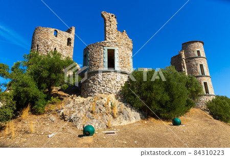 Remains of medieval stone Chateau Grimaud on hilltop Remains of medieval stone Chateau Grimaud on hilltop 84310223