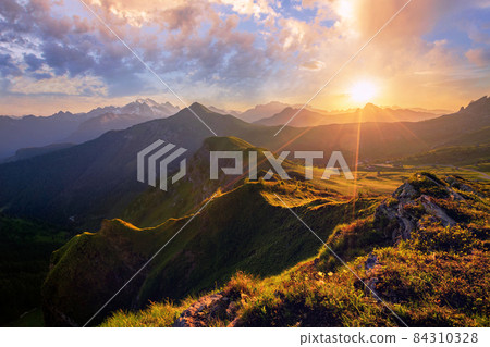 sunset in summer on Passo di Giau, Dolomites, Italy 84310328