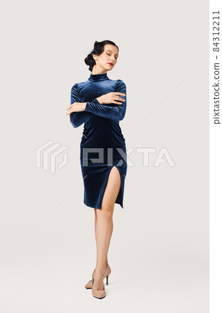 Full length portrait of beautiful young woman in evening dress 84312211