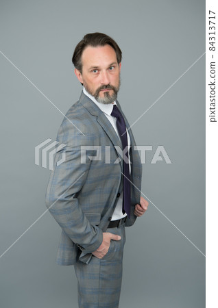 Classic wont go out of fashion. Senior lawyer grey background. Classic wont go out of fashion. Senior lawyer grey background. 84313717