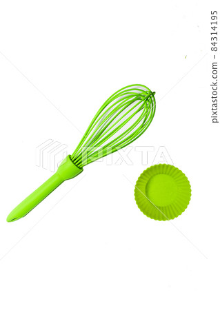 Set of green silicone cooking utensils isolated on white background Set of green silicone cooking utensils isolated on white background 84314195
