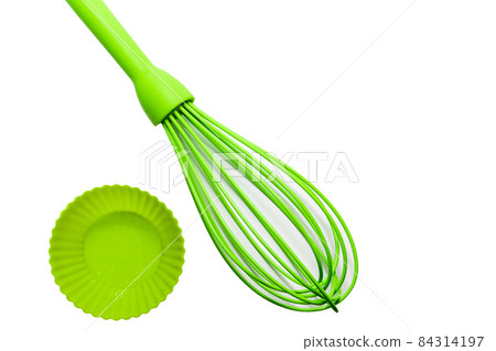 Set of green silicone cooking utensils isolated on white background Set of green silicone cooking utensils isolated on white background 84314197
