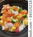 Close up of favorited japanese food called chirashi sushi made by mixed and put fresh seafood on sushi rice in the bowl. 84315218