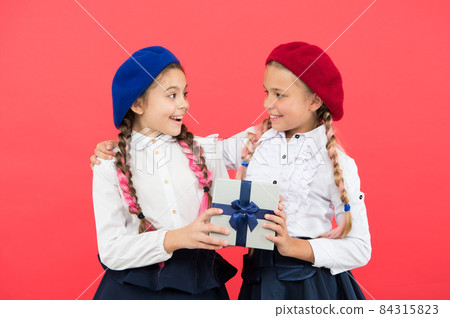 Giving the gift for you. Cute small child giving a present  84315823