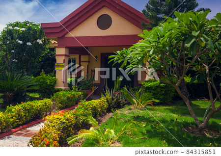 Beautiful Luxurious villa with an own swimming pool in Dominican Republic. summer residence on luxury Caribbean resort and beautiful garden. 84315851