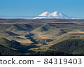 Big snowy mountain Elbrus beautiful nature landscape, Long distance view. 84319403