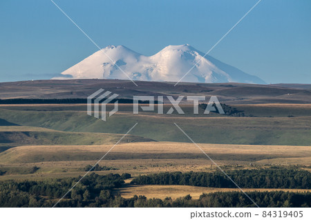 Elbrus mountains beautiful nature landscape, View at long distance. 84319405
