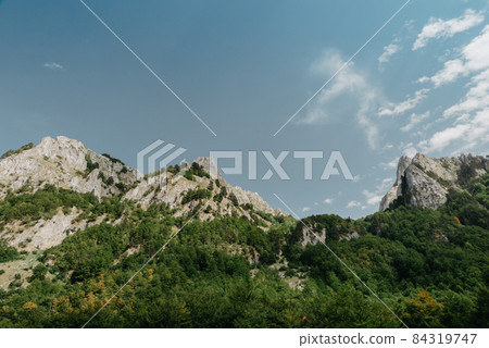 A view of the accursed mountains in the Grebaje Valley. Prokletije, also known as the Albanian Alps and the Accursed Mountains, is a mountain range on the Balkan peninsula, extending from northern 84319747