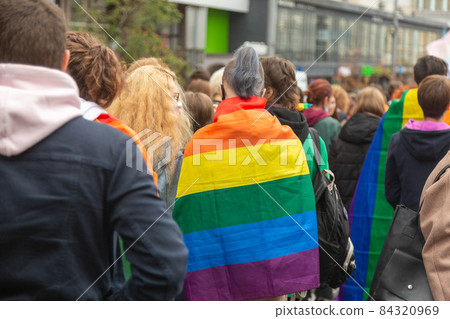 People support the LGBTQ community during the march. 84320969