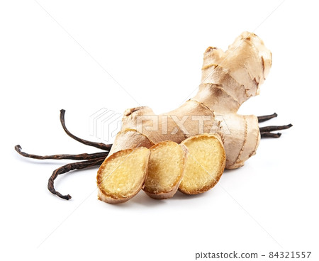 Ginger root with vanilla sticks on white backgrounds. Ginger root with vanilla sticks on white backgrounds. 84321557