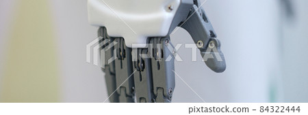 Closeup of white plastic arm of modern robot Closeup of white plastic arm of modern robot 84322444