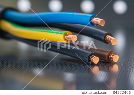 Electrical cable close-up isolated on shiny metal background Electrical cable close-up isolated on shiny metal background 84322466