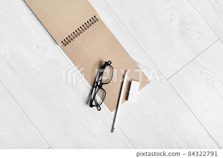 Sketchbook, glasses, pencil, eraser Sketchbook, glasses, pencil, eraser 84322791