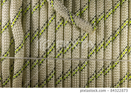 Close-up of coiled sport climbing rope 84322873