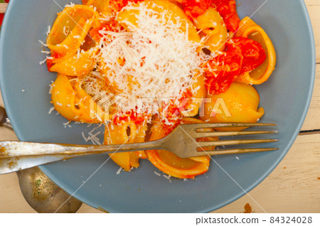 Italian snail lumaconi pasta with tomatoes 84324028