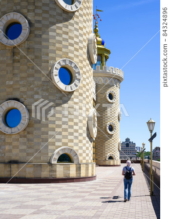 Person passes puppet theatre Ekiyat, Kazan, Tatarstan, Russia Person passes puppet theatre Ekiyat, Kazan, Tatarstan, Russia 84324896
