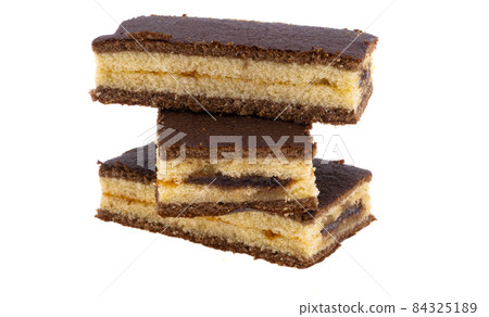 chocolate sponge cake isolated 84325189