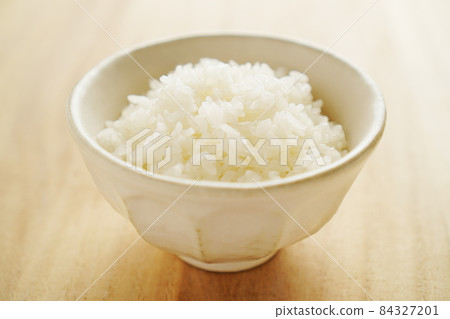 Rice served in a bowl 84327201