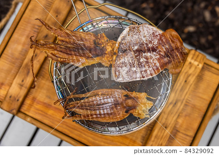 Outdoor cooking at the campsite 84329092