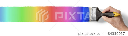 Hand graphic material to apply rainbow-colored paint with a brush Hand graphic material to apply rainbow-colored paint with a brush 84330037