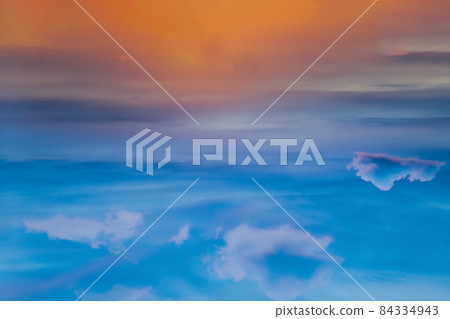 The sun shines through the clouds in the sunset sky with dramatic light. The shape of the clouds evokes imagination and creativity. The sun shines through the clouds in the sunset sky with dramatic light. The shape of the clouds evokes imagination and creativity. 84334943