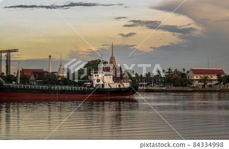 View of Chao phraya river has cargo ships docked in the middle river and the back is Wat Bangkrachaonok area. View of Chao phraya river has cargo ships docked in the middle river and the back is Wat Bangkrachaonok area. 84334998