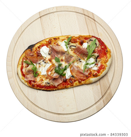 Delicious pizza served on wooden plate isolated on white background. File contains clipping path Delicious pizza served on wooden plate isolated on white background. File contains clipping path 84339303