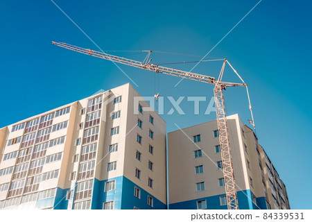 High-rise building and crane 84339531