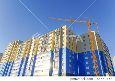New highrise houses and construction cranes 84339532