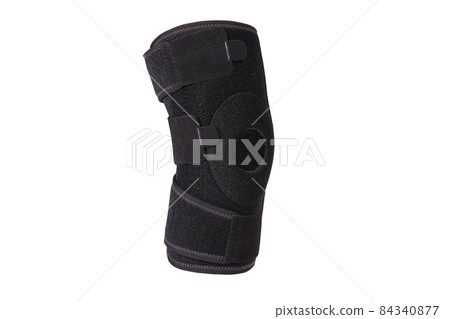 Knee Support Brace on leg isolated on white background. Orthopedic Anatomic. Braces for knee fixation, injuries and pain. Knee Joint Bandage Sleeve. Elastic Sports. 84340877