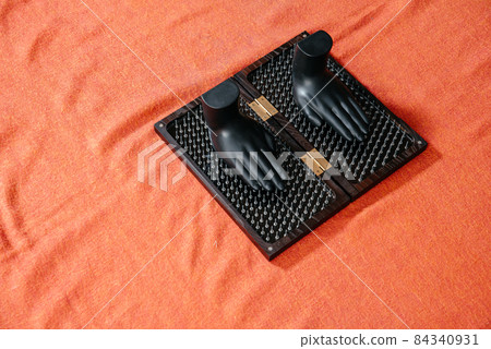 Sadhu board with sharp metal nails. Yoga and health concept Sadhu board with sharp metal nails. Yoga and health concept 84340931