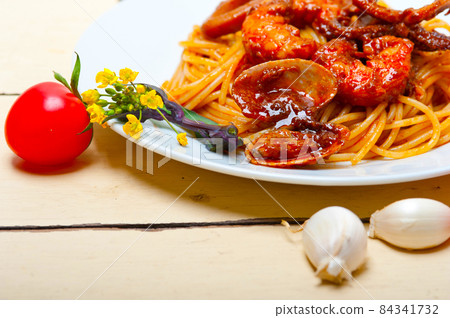 Italian seafood spaghetti pasta on red tomato sauce Italian seafood spaghetti pasta on red tomato sauce 84341732