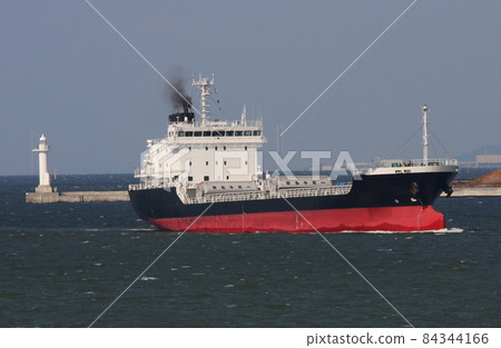 A small domestic cargo ship arriving at Osaka Port A small domestic cargo ship arriving at Osaka Port 84344166