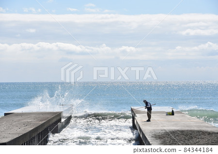Rough autumn Chigasaki coast angler 84344184