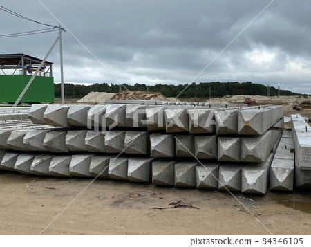 stack of concrete blocks, construction site against a blue sky 84346105