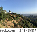 Griffith Observatory on a sunny day and the cityscape of Los Angeles 84346657