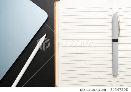 Office Supplies Over Desk With Keyboard And Glasses And Coffee Cup For Working Remotely, Assorted School Utilities For Studying With Hot Drink And Eyeglasses. 84347298